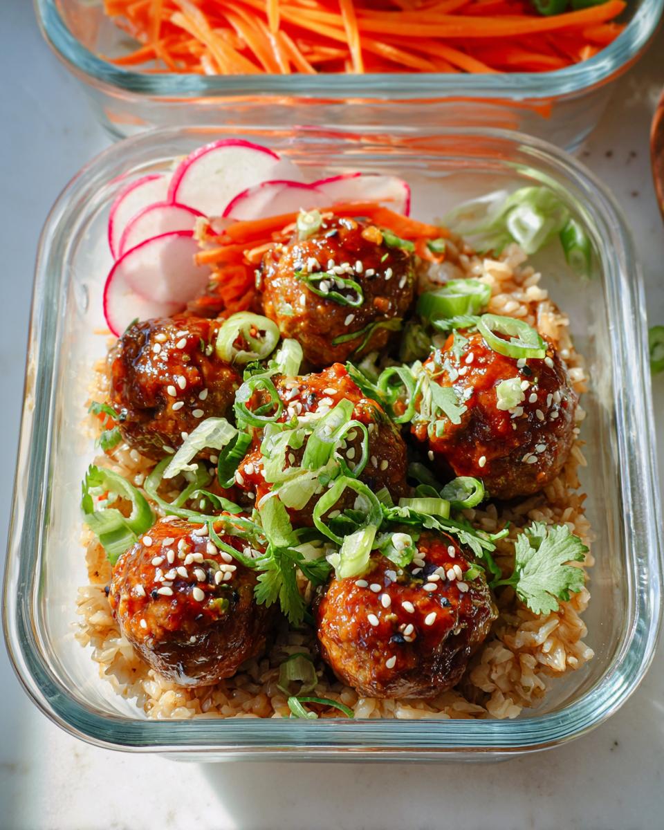Delicious Maple-Sriracha cocktail meatballs served over rice with garnishes.